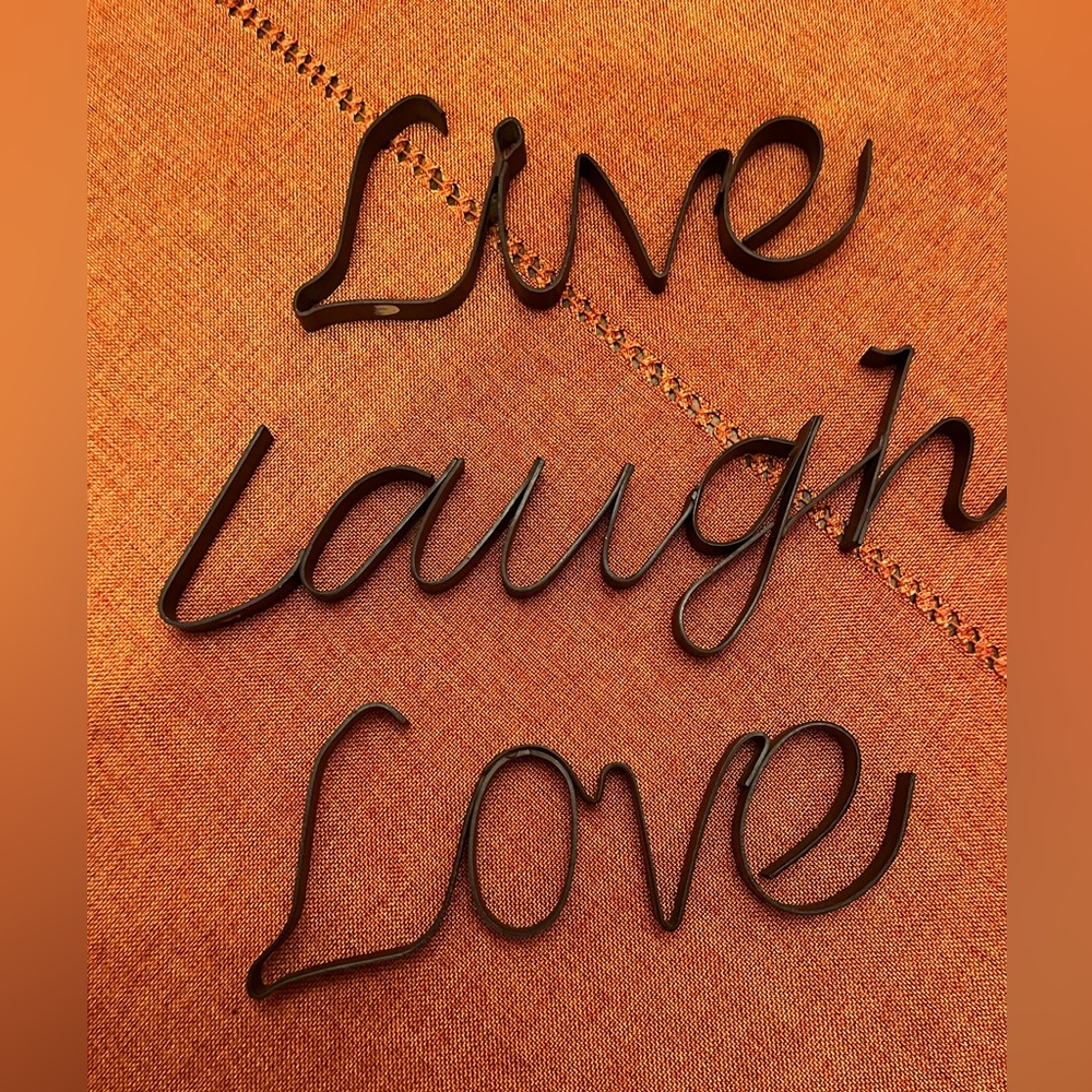 Live Laugh Love metal wall hangings.